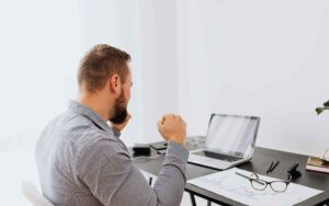 Man Working in his Laptop